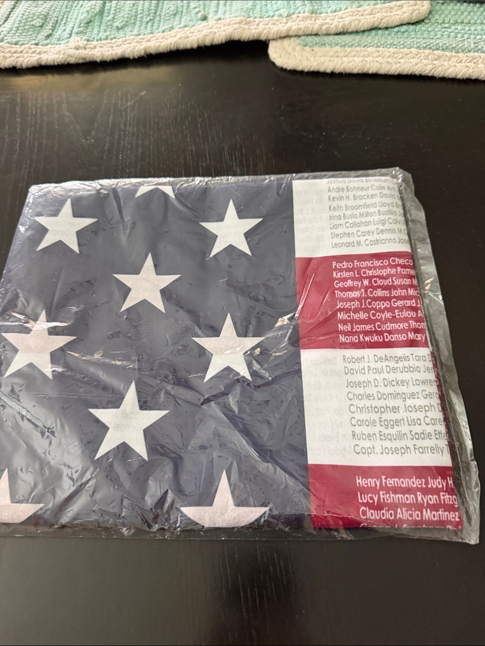 9/11 American Flag in original packaging- Lists all who lost their life